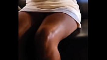 In the public eye, an amateur wife teases with an upskirt action