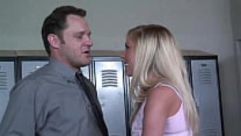 Loveable schoolgirl with a shaved head and blonde hair