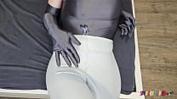 The spandexQueen makes two appearances and milks his cum on her gray spandex body while wearing white leather leggings.