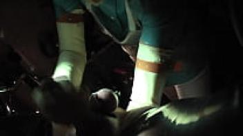 Agnes, the rubber nurse, is trying on her brand new blue latex nurse dress for the first time. The test subject has his colon cunt crammed to the elbows, and his cock is successfully milked off.