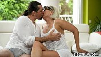 GILF Jessye engages in conflict with a massive cock.