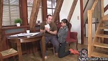 The table is occupied by his girlfriend, who is also present.