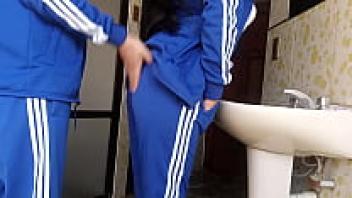 There is a quickie being recorded in the restroom of the school.