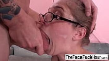 Teen slobbering on his stiff cock while wearing glasses
