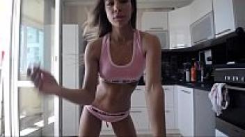 Sport girl displays her body.