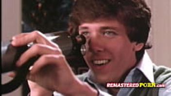 A vintage couple engages in massive orgy at a classic sex party.