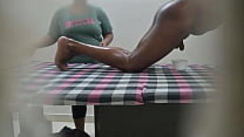 squeezing sperm milk outside in the massage spa.