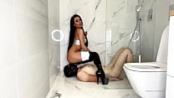 Evil Woman: harsh pegging in silver leggins and pee.