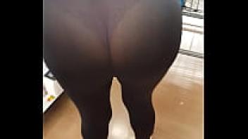 Latina wife wearing spandex at the supermarket with a large ass