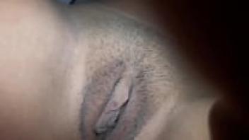 A young girl engaging in masturbation