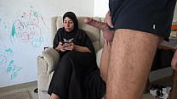 Teenage stepboys are allowed to cum and masturbate on her hijab by an Arab grandmother.