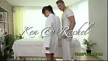 A gorgeous brunette receives an oil massage.