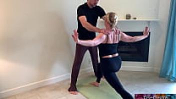 Stepson stretches Stepmom's pussy and assists her with yoga.
