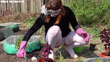 My girlfriend's upskirt during the flower-planting