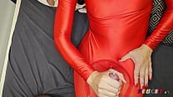 SpandexQueen makes him cum on her red spandex nylon leggings after sucking his dick twice.