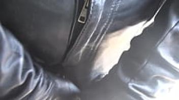 Bella wearing rubber riding boots and long operagloves