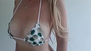 Babe, take advantage of me. Round breasts, swollen nipples, and a microbra