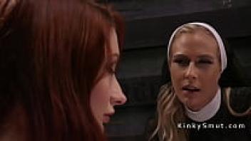 Anal play between a redhead and a nun