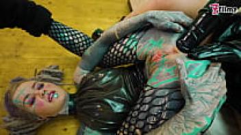 Babes with LATEX ANAL tattoos stretching their asses