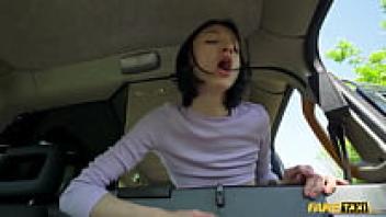 Fake Taxi: A shy, short-haired adolescent is seen pumping her moist pussy on the taxi's backseat.
