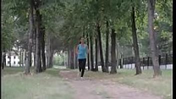 A lovely girl works out at the gym.