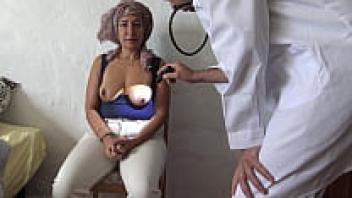 In his London clinic, a perverted British doctor examines an elderly woman.