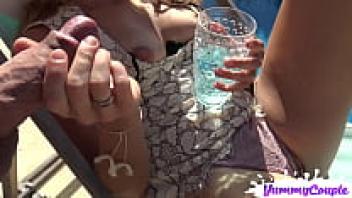 YummyCouple MILF cum handjob: party cutie receives a crazy cumshot all over her while being loved in the pool.