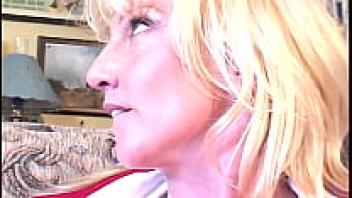 A kiss from a blonde mother makes her feel loved and licked.