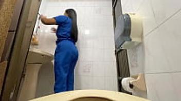 A nurse gets caught on camera urinating in the hospital restroom (large stream).