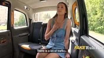 In the taxi, a flawless girl with flawless skin releases her breasts.