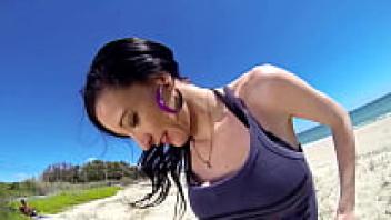 Milf sex with a brunette on a beach