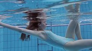 Underwater, Anna Netrebko is a slender little teen.