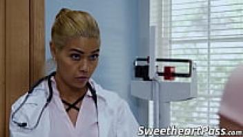 The dyke doctor unexpectedly licks Teenie's pussy.