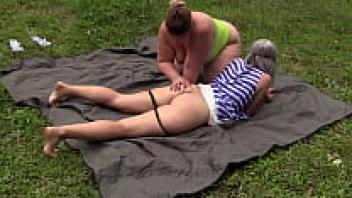 Lesbians who are mature and have large, attractive asses enjoy being outside while performing deep vaginal fisting while wearing medical gloves. They also engage in amateur fetish and fat cunt.