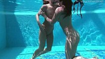 Lindsay and Jessica are swimming in the pool nude.