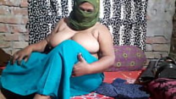 An attractive Indian wife in the bedroom