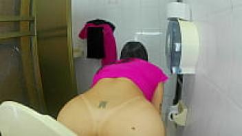 A nurse is captured on camera in a hot hospital restroom by an amateur.