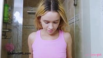 A gorgeous teen blonde takes pleasure in a sensual bath.