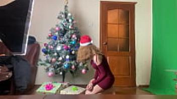 Stacy in French-cut black panties decorating the tree