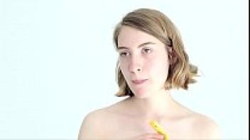 Playing with a banana and teasing a blonde beauty