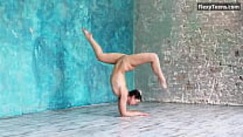 Babe in glasses with flexibility Kim Nadara stretches
