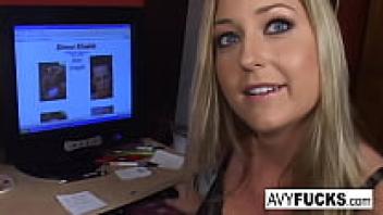 Busty Avy confronts a large cock.