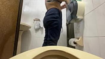 A negligent nurse is caught on camera in an office public restroom.