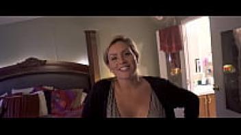 Coco Vandi, the stepmother, assists her injured stepson in taking a bath.