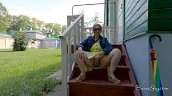 In a wilderness park, a buttplugged beauty