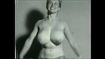 A thin gymnast with large melons enjoys participating in sports while wearing gorgeous underwear.