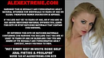 Kinky Niky, a hot porn girl in white robes, has prolapse and self-anal fisting.
