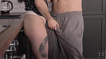 Creampie is served to a hot brunette in the kitchen.