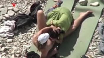 Voyeur Beach. Unabashed nudists having sex next to other people on the beach