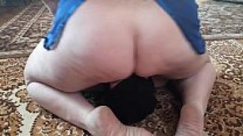 After face-sitting, a mature stepmother sits on her stepson's face.